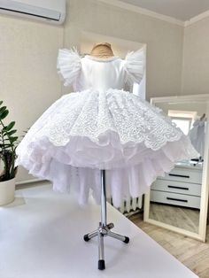 Elegant Princess Dress With Ruffles For First Communion, White Tulle First Communion Dress With Ruffles, Elegant Short Sleeve Pageant Gown, Princess Style White First Communion Dress With Ruffles, Ruffled Ball Gown For First Communion And Wedding, Elegant Short Sleeve Princess Dress For Confirmation, White Ruffled Princess Dress For First Communion, White Princess Dress With Ruffles For First Communion, Elegant First Communion Dress With Short Sleeves For Pageants