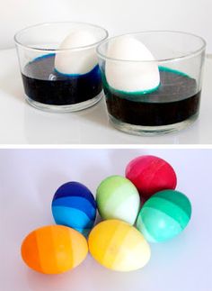 four different colored eggs sitting in bowls next to each other