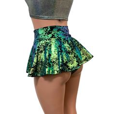 10" Jade Blue Holographic Super Mini Skater Skirt | High-Waisted Hologram Skirt – Peridot Clothing #raveoutfits #festivalfashion #raveclothing #raveskirts #skaterskirts #velvet #velvetclothing #festivaloutfits #plurlife #ravers #edcoutfits Dinosaur Rave Outfit, Rave Skirt Outfit, Hologram Skirt, Rave Outfits Skirts, Skater Skirt Outfit, Rave Outfits Women, Velvet Skater Skirt, Rave Skirt