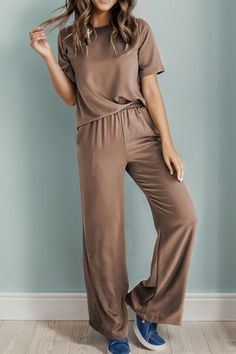 Features: Basic style Number of pieces: Two-piece Stretch: Slightly stretchy Material composition: 65% polyester, 30% viscose, 5% elastane Care instructions: Machine wash cold. Tumble dry low. Imported Product measurements:S:Bust 38.19 in, Waist 26.77 in, Shoulder 15.16 in, Sleeve Length 9.45 in, Top Length 25.00 in, HIP 38.58 in, Bottom Length 42.32 inM:Bust 40.55 in, Waist 28.74 in, Shoulder 15.75 in, Sleeve Length 9.65 in, Top Length 25.79 in, HIP 40.94 in, Bottom Length 42.72 inL:Bust 42.91 Stretch Brown Pants For Loungewear, Brown Stretch Pants For Loungewear, Stretch Brown Lounge Pants, Versatile Stretch Viscose Pants, Casual Brown Elastane Bottoms, Stretch Solid Color Pants For Loungewear, Casual Stretch Viscose Pants, Stretch Solid Color Lounge Pants, Casual Solid Color Viscose Pants