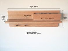 a wooden shelf with measurements for the top and bottom section, along with two smaller pieces of wood