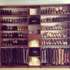 a closet filled with lots of different types of shoes