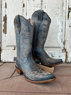 A nod to traditional Western style, Hazen pairs a walkable heel with all-over stitching. It's a works-with-everything boot you can dress up (say with a flowy, romantic dress) or down (a graphic tee and jeans). Shaft Height - 12" Circumference - 14" Heel - 1.5" X Toe ATS® technology provides ergonomic support on uneven terrain Leather lining Hand nailed, color stained Veg Tan leather sole Resoleable Goodyear leather welt construction Five-row stitch pattern 5.24 Snip Toe Cowgirl Boots, Blue Cowboy Boots, Whisky Barrel, Ariat Boots, Western Store, Boot Companies, Cowgirl Western, Veg Tan Leather, Western Hats