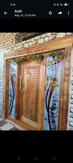 an image of a wooden door with glass panels on the front and side doors that are decorated