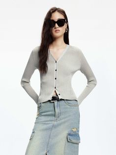 MO&Co. Women's Ribbed Knit Slim Cardigan The textured ribbed design, accented with metallic details, adds a touch of sophistication to any outfit. With its slim and stretchy fit, this cropped cardigan pairs perfectly with high-waisted skirts for a chic ensemble. Features : - Slim stretchy fit, cropped cut- V-neckline, long sleeves- Ribbed texture with metallic details Code: MBD1CAR020The back length of size S is 52.5cmMATERIALS & CARE Material: 68% Polyamide 32% Metallized fibreREMINDER: All ite Slim Cardigan, Waisted Skirts, Ribbed Texture, Cropped Cardigan, Ribbed Knit, High Waisted Skirt, Long Sleeves, High Waisted, Texture