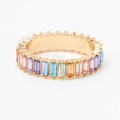 Add a pop of color to your ring collection! This gold-tone ring features a baguette design of rainbow stones in emerald cut shapes. Sizes Available: 6, 7, 8, 9 Finish: Gold-tone Material: Metal - Claire's Gold Rainbow Baguette Ring Girly Rings, Rainbow Wedding, Rainbow Rings, Baguette Ring, Prom Heels, Rainbow Jewelry, Jewelry Hair, Fashionable Jewelry, Ring Collection