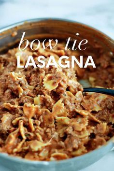 a bowl filled with pasta and meat in sauce, with the words bow tie lasagna above it