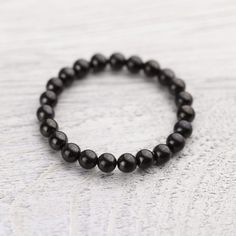 Wrist Malas Shungite Protection Bracelet The Root Chakra, Healing Abilities, Shungite Stones, Bad Spirits, Wrist Mala, Black Stones, Boost Energy Levels, Red Tigers Eye, Daily Gift