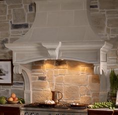 a kitchen with an oven, sink and counter top in it's center area