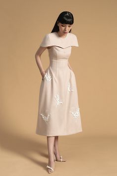 An embroidery dress is combined delicately with a cut-out cape to create a nobility and elegant look. It is an outstanding outfit to be worn on every formal occasion. Note:*Processing time takes 10-15 working days (including times for manufacturing and NOT including shipping time)**Made To Order Definition:- The product is currently unavailable and not in mass production.- The product will be manufactured immediately after its order has been placed successfully.- The product can be customized to Elegant Cream A-line Evening Dress, Elegant Cape Dress For Banquet, Elegant Spring Evening Dress With Cape Sleeves, Fitted Cape Evening Dress For Banquet, Fitted Cape Evening Dress For Gala, Elegant Evening Dress With Cape Sleeves For Banquet, Luxury Fitted Dress With Cape Sleeves, Elegant Beige Dress For Banquet, Formal Fitted Cape Evening Dress