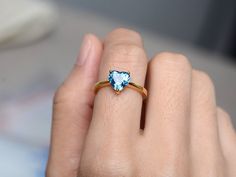 Welcome to my shop, you can find many beautiful gemstone jewelry here, and you also can ask for customized service. Main Stone: 8*8 heart cut London blue topaz Accent Stones: none Metal: 925 sterling silver plated with yellow gold. I also can provide metal options such as 14k solid yellow/white/rose gold Setting: prong setting More rings please go to my shop home: https://www.etsy.com/shop/XCjewelryStudio?ref=hdr_shop_menu It's a perfect gift for who born in November(birthstone),it's quite comfo Meaningful Rings, Topas Ring, Gemstone Solitaire Ring, Ring Heart, London Blue Topaz Ring, 925 Silver Ring, Pinky Ring, Blue Gemstones, Blue Topaz Ring