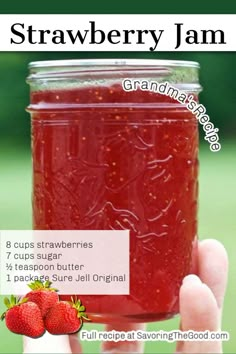 a hand holding a jar of strawberry jam with instructions for how to make it in the microwave