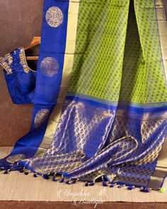 "One of the beautiful combinations in Pure silk Authentic Kanchipuram Silk Saree in Moss Green color with minimalistic woven Self Brocade Koravai with Dark Blue borders having Horse weave all over the borders complemented with Intricate hand worked blouse in size 38\" FACTS ABOUT THE MOTIFS: KUTHIRAJ: Horses galloping across the border of this Kanchipuram Silk sari form a stunning pictorial panel. This magnificent creature is a predominant feature of the mandapams of temples. The horse is also c Designer Tissue Silk Kurta With Pallu, Pista Green Silk Anarkali Set With Pallu, Silk Anarkali Set In Pista Green With Pallu, Designer Pista Green Cotton Silk Blouse Piece, Festive Pista Green Cotton Silk Blouse Piece, Pista Green Silk Traditional Wear For Navratri, Green Zari Weaving Art Silk Kurta, Green Art Silk Kurta With Zari Weaving, Transitional Pista Green Chanderi Blouse Piece