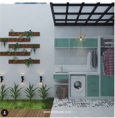 an image of a laundry room setting with plants on the wall and dryer in the corner