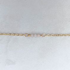 The daintiest adornment for your wrist (or anklet!). Details: - 14k gold-filled cable chain - your choice of round micro-faceted gemstones - round spring clasp Please note: If you do not see your bracelet/anklet size, please reach out to us at info@hellorising.com. We believe everyone deserves to wear pretty jewelry. Gemstones: Clear quartz, known as the stone of power, is believed to be able to amplify energies and protect against negativity. Labradorite, a stone of transformation that can prot Minimalist Adjustable Jewelry For Meditation, Dainty Rose Quartz Bracelets With Natural Stones, Dainty Rose Quartz Bracelet With Natural Stones, Dainty Rose Quartz Beaded Bracelets, Minimalist Birthstone Jewelry For Meditation, Dainty Rose Quartz Healing Bracelet, Spiritual Rose Quartz Jewelry For Friendship, Everyday Spiritual Rose Quartz Jewelry, Minimalist Crystal Bracelet With Natural Stones For Everyday