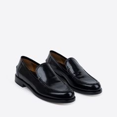 In rich, black Spazzolato leather, our College Loafer is bridging tradition and trend. Elegant, breathable, with padded insoles and a classic round toe. Pairs well with a mini skirt and a Harvard degree. Classic Calf Leather Slip-ons For Office, Sleek Patent Leather Loafers With Leather Sole, Classic Patent Leather Slip-on Loafers, Classic Black Slip-ons With Brogue Detailing, Classic Black Slip-ons With Stitched Sole, Timeless Black Slip-on Loafers, Sleek Calf Leather Loafers With Leather Sole, Sleek Calf Leather Slip-on Loafers, Elegant Black Tassel Loafers With Stitched Sole