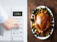 a turkey sitting on top of a white plate next to an oven and calculator