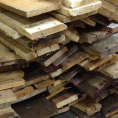 many pieces of wood stacked on top of each other