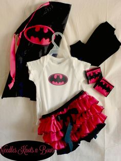 This+adorable+Batgirls+costume+is+perfect+for+fun+photoshoots,+heading+out+to+Comic+Con,+Birthday+themed+Parties+and+of+course+Halloween.++ This+listing+is+for+a+4+piece+set+which+includes:++T-shirt+or+Onese+(depending+on+the+size+you+order+or+your+preference),+cape,+legwarmers+and+ruffled+bloom... Pink Themed Costume For Costume Party, Pink Themed Costume For Party, Pink Themed Costume Accessories For Costume Party, Pink Themed Halloween Costume, Fun Costumes For Costume Party And Cosplay Events, Fun Costumes For Cosplay And Costume Parties, Themed Pink Costumes For Cosplay Events, Cute Fitted Costumes For Role Play, Cute Fitted Costume For Role Play