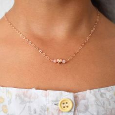 Dainty children's necklace with a choice of pink opals, blue aquamarine, or rainbow moonstone. It features a heart-shaped chain in either sterling silver or 14k gold filled with power stones that promote love and positivity. Makes a beautiful gift for girls. About the Gemstones Pink Opal promotes love, self-worth, and acceptance. It is a great stone for children who suffer from nightmares as it brings calmness and soothing energy. Birthstone: October Aquamarine is believed to contain the power o Dainty Heart Necklace, Birthstone Crystals, Girls Heart, Power Stone, Self Worth, Dainty Bracelets, Gift For Girls, Evil Eye Necklace, Aquamarine Blue