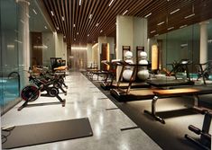 an indoor gym with treadmills and exercise equipment