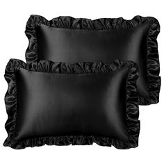 two black pillows with ruffles on them