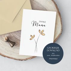 a card with the words dance mama on it next to some envelopes and a rubber stamp