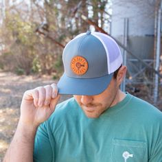 Keeping the hot southern sun out of your eyes and away from your face is important during the heat of June, July and August--both for guys and gals. Our classic, wide-brimmed trucker hat subtly announces your southern roots while shading your head and face. Crown: Structured Pro Crown | Pro-Stitched Finish | Adjustable Snap-Back Visor: Pre-Curved | Curved or Flat - Shape It How You WantSweatband: 3-Part Comfort Cotton FitClosure: Plastic Adjustable Snap-Back Sizes: Adult | One Size Fits Most Summer Camping Baseball Cap With Flat Brim, Summer Trucker Hat With Flat Bill For Travel, Summer Flat Bill Trucker Hat For Travel, Summer Travel Trucker Hat With Flat Bill, Summer Camping Hat With Flat Bill, Summer Camping Hats With Flat Bill, Curved Bill Baseball Cap For Summer Camping, Spring Trucker Hat With Curved Brim For Outdoor Activities, Wide Brim Snapback Hat For Spring