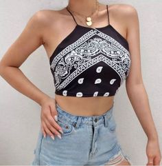 Elevate your style with our cute black print bandana-style cropped top! This versatile piece is perfect for both casual wear and a night out on the town. Casual Fitted Printed Crop Top, Fitted Casual Printed Crop Top, Edgy Cropped Crop Top For Spring, Printed Fitted Crop Top For Summer, Edgy Graphic Print Crop Top For Summer, Casual Printed Stretch Crop Top, Printed Stretch Casual Crop Top, Edgy Summer Crop Top, Edgy Cropped Summer Crop Top