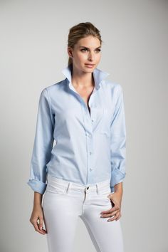 PALE BLUE TWILL FABRIC Fall in love with this sublime baby blue, in a discerning diagonal twill weave. As fresh as it is serene, this color flatters all who wear it. 100% Italian Cotton THE WEEKEND SHIRT The Weekend Shirt embodies the carefree spirit of Saturdays and Sundays that you will enjoy and wear 7 days a week. Dress it up or down with your favorite jeans, edgy leather pants or a chic pencil skirt—it’s your go-anywhere, do-anything shirt. Sartorially influenced by menswear, this classic s Light Blue Slim Fit Top With Spread Collar, Formal Slim Fit Light Blue Shirt, Light Blue Fitted Office Shirt, Light Blue Collared Shirt For Work, Light Blue Fitted Shirt For Office, Blue Spread Collar Shirt For Office, Fitted Light Blue Office Shirt, Light Blue Button Cuffs Shirt For Work, Light Blue Dress Shirt For Office In Spring