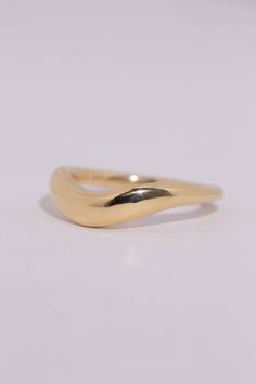 The Arc is a hand carved ring with a thick curve. Perfect for stacking or wearing on it's own. At the thickest part of the curve, the ring measures 4mm, and tapers in the back to 2mm. The thickness of the ring ranges from 1.8-2.5mm. Leave note at checkout indicating your ring size. Quarter and half sizes available. Made in Los Angeles with recycled 14k or 18k gold. Your choice of yellow, rose, or white. Hand engraving available on the inside of the band (up to 10 characters). Made to order, plea Hand Carved Ring, Golden Coast, Carved Ring, Custom Ring Designs, White Hand, Hand Engraving, Yellow Rose, Ring Necklace, Shop Earrings