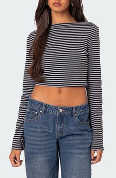 This stretchy cotton top is cut with long, wide sleeves and allover stripes that complement its midriff-baring length. Boat neck Long sleeves 95% cotton, 5% spandex Machine wash, dry flat Imported Striped Long Sleeve Top For Fall, Fall Striped Long Sleeve Top, Striped Long Sleeve Cotton Top, Trendy Long Sleeve Cotton Crop Top, Striped Long Sleeve Crop Top For Fall, Stretch Cotton Long Sleeve Crop Top, Cropped Cotton Long Sleeve Top For Spring, Striped Fitted Cropped Top, Fitted Striped Cropped Top