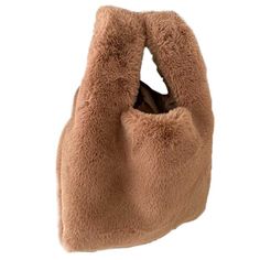 Our Lucia Plush Bag is the perfect bag for cold weather. This small bag features a soft plush fabric and brown satin interior making it warm to hold and easy to clean.Dimensions: 9.4" L x 3" W x 8.7" H (handle is 4.7" H) Winter Rectangular Hobo Bag For Everyday Use, Brown Everyday Bag For Winter, Everyday Brown Winter Bag, Brown Rectangular Shoulder Bag For Winter, Winter Travel Brown Shoulder Bag, Winter Hobo Shoulder Bag For Daily Use, Soft Shoulder Bag For Daily Use, Winter Beige Shoulder Bag, Brown Winter Shoulder Bag For Shopping