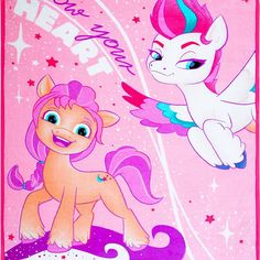 a pink poster with two little ponys on it's back and the words happy new year