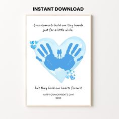 a blue handprinted heart with the words grandparents hold our tiny hands just for a little while, but they hold our hearts forever