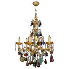 a chandelier with many different colored glass beads