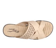 Experience both comfort and fashion when you step into the Coho slide sandal by Easy Street. The unique perf design and interwoven strap detailing will enhance all your favorite casual outfits. Designed with our unique Comfort Wave insole that padded with textured comfort waves from heel to toe. On everyone's favorite flexible unit bottom. Manmade Faux Leather upper, Slip on for easy entry,1\ slightly wedged sole, Open round toe, Comfort Wave Air Cushioned Insole with soft lining, Manmade outsol American Eagle Sandals, Shoe Makeover, Casual Sandals Womens, Boho Style Jewelry, Slip On Sandals, Easy Street, Casual Sandals, Style Jewelry, Slide Sandals