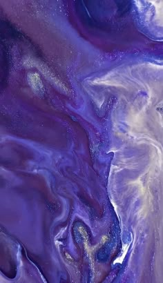 an abstract painting with blue and purple colors on it's surface is shown in this image