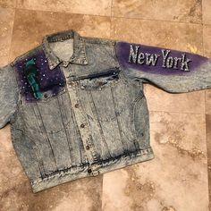 "Vintage 80s 90s NEW YORK Denim Jacket with the most amazing Details ONE ONLY DON'T MISS OUT LOVE ROCKS VINTAGE ITEM DETAILS & DESCRIPTION . Classic Denim Jacket - Biker, Motorcyle Style . Front Button . UnLined Label: Size: - refer to Measurements - NO RETURNS FOR NOT FITTING! Era: est. 1980s 1990s Color: Blue Denim - refer to Photographs Material: Denim Condition: Pre-Owned - Vintage - Very Good - expect Vintage wear & condition! This does have some soiling, refer to pictures. Refer to Fitted Retro Denim Jacket For Streetwear, Reworked Denim Jacket For Fall Streetwear, 90s New York, Classic Denim Jacket, Love Rocks, Vintage Denim Jacket, Denim Coat Jacket, Big Apple, Vintage Wear