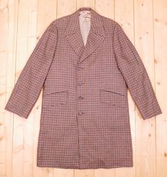 "Vintage 1960's/70's Brown Checked Plaid Overcoat  - Satin lined - Perfect vintage fade and wear - Very Good vintage condition Chest - 44\" Sweep - 50\" Length - 43\" Shoulders - 17 1/2\" Sleeve - 27 1/2\" #5595" Retro Wool Outerwear With Lapel Collar, Vintage Single Breasted Long Coat, Vintage Single-breasted Long Coat, Vintage Long Single-breasted Coat, Retro Notch Lapel Outerwear For Winter, Retro Winter Outerwear With Notch Lapel, Vintage Long Coat Blazer For Winter, Retro Long Coat For Workwear, Vintage Winter Long Coat Blazer