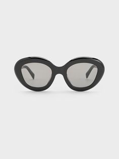 Turn on the sass with these cateye sunglasses. The timeless style has been emboldened with thicker frames, which maximise the lifting effect they have on the face. With their classic black finish, this versatile pair will complement a wide range of outfits and styles. Made out of recycled acetate and cupronickel, they are better for the environment and sturdy at the same time. Belt Ring, Cateye Sunglasses, Charles Keith, Of Outfits, Kids Sale, Sunglasses & Glasses, Belt Size, Sales Gifts, Cat Eye Sunglasses