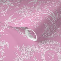 a pink wallpaper with white designs on it