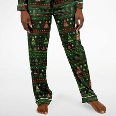 Indulge in the luxury you truly deserve. Treat yourself to a remarkable night's sleep this Holiday Season with our exquisite Christmas Tree African Print satin pajama set, adorned with a captivating Christmas Trees. Crafted to offer unparalleled comfort, these pajamas will have you feeling like royalty as you slip into a tranquil slumber.Experience the unmatched softness of our satin fabric, akin to the gentle touch of butter on your skin. The supple, satiny texture guarantees you'll ascend to c Satin Pajama Set, Satin Pajama, Mens Sleepwear, Holiday Patterns, Satin Pyjama Set, Green Christmas Tree, Gentle Touch, Satin Pajamas, Mens Green