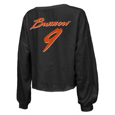 Show your favorite Cincinnati Bengals player some love in chic fashion with this Joe Burrow Off-Shoulder V-neck T-shirt from Majestic Threads. Its printed graphics in a distressed design feature Cincinnati Bengals script on the front and his name and number displayed across the back. A cropped hem completes the stylish look of this Joe Burrow top.Show your favorite Cincinnati Bengals player some love in chic fashion with this Joe Burrow Off-Shoulder V-neck T-shirt from Majestic Threads. Its prin Fall Sports V-neck Tops, Black V-neck Top For College, Fall College V-neck Tops, Fall V-neck Tops For College, Sporty V-neck T-shirt For Fall, Black Tops For College In Spring, Black Spring Tops For College, Game Day V-neck Top With Letter Print, V-neck Game Day Top With Letter Print