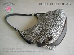 the back side of a leopard print bag