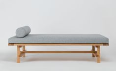 a bench with a cushion on top of it