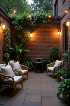 Cozy enclosed courtyard with hanging chairs and ambient lighting Small Paved Courtyard Ideas, New Orleans Courtyard Ideas Patio, Courtyard Inside House, Narrow Courtyard Ideas, Courtyard Entryway Front Entry, Backyard Courtyard Ideas, Small Front Patio, Pergola Decor Ideas, Patio Courtyard Ideas