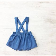 Gorgeous baby boy suspender short made from denim fabric perfect for this summer! The romper has elastic for a comfortable fit featuring adjustable crossover shoulder straps with simple snap closures. Can be worn in the summer with a t-shirt or in the winter with a long sleeve top. ♡ VIEW ADDITIONAL ITEMS AT : www.misslyla.com ♡ ♡ GORGEOUS HANDMADE ITEMS FOR YOUR LITTLE MISS. ( Size 0000 - 5 years.) ♡ This is item is made to order. Please leave a note of which size you require when checking out. Playful Medium Wash Cotton Bottoms, Cute Denim Blue Cotton Shorts, Cute Denim Bottoms For Playwear, Blue Denim Bottoms For Playwear, Cute Blue Diaper Cover For Playtime, Cute Dark Wash Cotton Bottoms, Cute Medium Wash Cotton Bottoms, Playful Summer Bottoms For First Birthday, Cute Summer Bottoms For Playdate