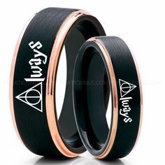 two black and rose gold wedding rings with the words harry potter on them