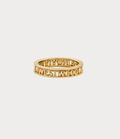 The Vivienne Westwood Westminster ring is named after the esteemed Westminster district in London, renowned for its rich history and cultural importance. The piece receives a silhouette crafted from recycled silver, adorned with a gold-tone finish that elegantly encircles the slim lettering logo on the band. Gold Vivienne Westwood, College Wishlist, Vivienne Westwood Ring, Vivienne Westwood Jewellery, Expensive Taste, The Vivienne, Ringe Gold, Lettering Logo, Backpack Travel Bag